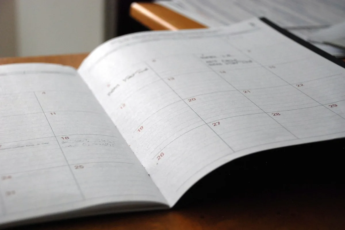 Planner on a desk used to track the DAAD scholarship application deadline