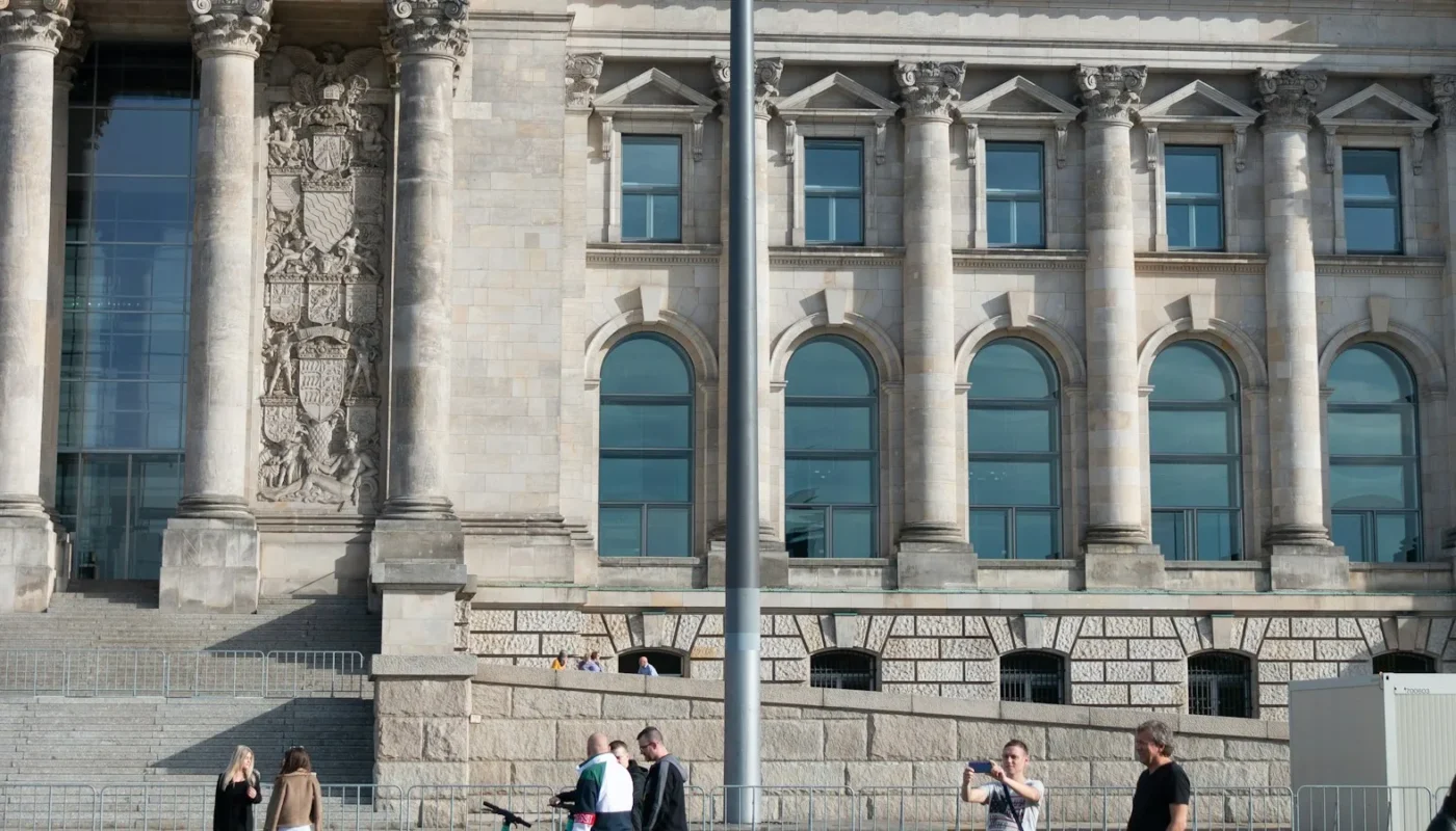 German flag over a building in Germany, where DAAD scholarships fund international students