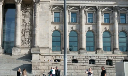 German flag over a building in Germany, where DAAD scholarships fund international students