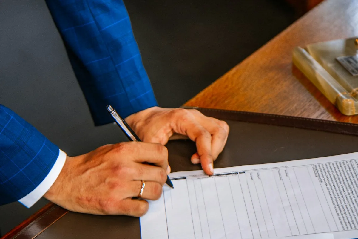 Applicant completing paperwork to check the minimum salary for a Skilled Worker visa