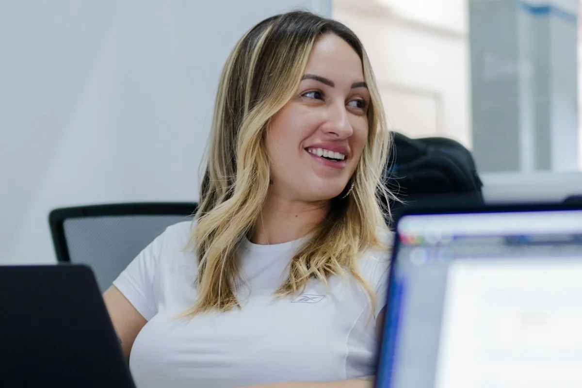 Graduate working on a laptop after switching from a Student visa to the UK Graduate visa