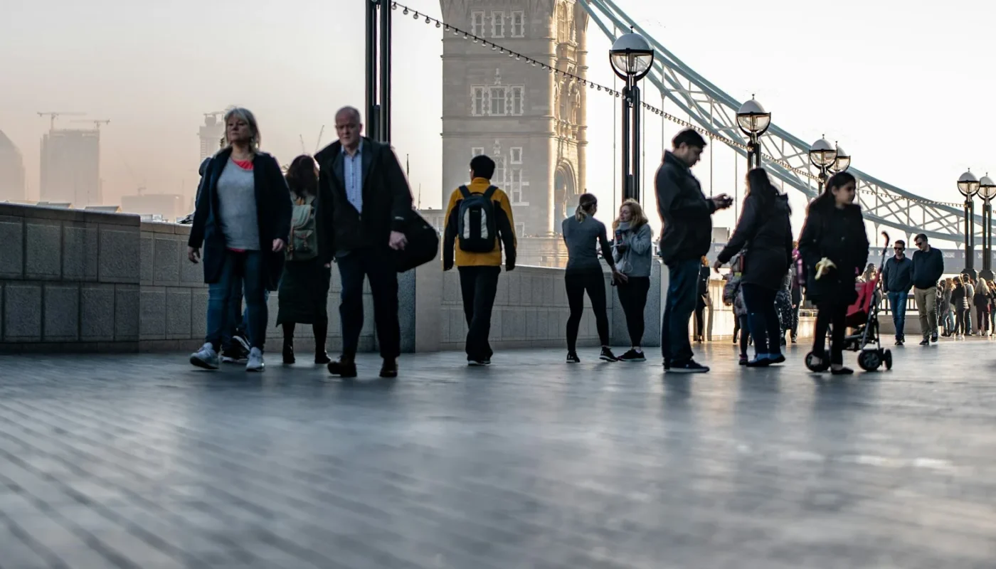 International students near Tower Bridge in London, where higher UK student visa living cost rates apply