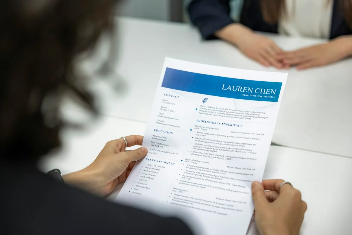 Recruiter reviewing a CV for UK visa sponsorship jobs