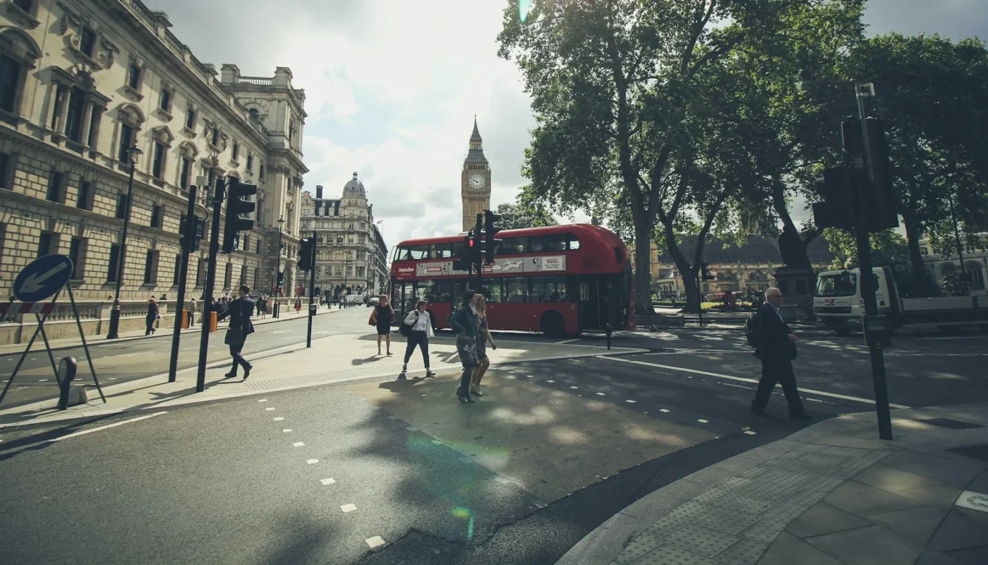 Busy London street with a red bus, where many UK visa sponsorship jobs are based