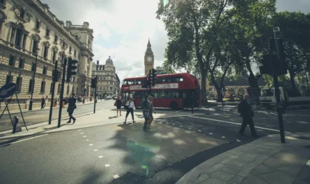 Busy London street with a red bus, where many UK visa sponsorship jobs are based