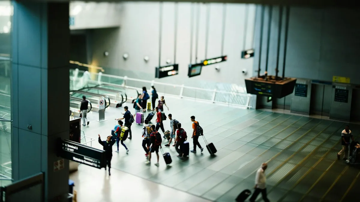 Students with luggage walking through an airport on their way to study abroad