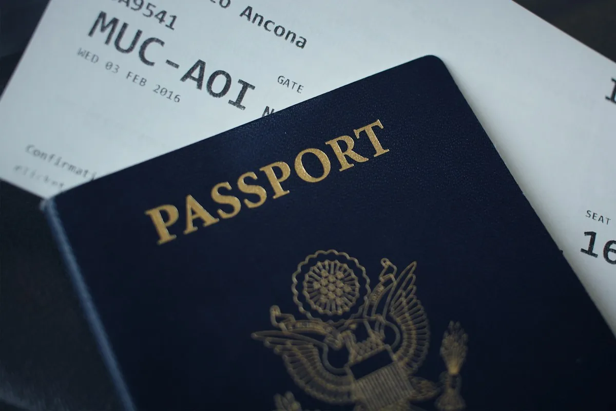 Passport and documents for a work visa after visa sponsorship from an employer